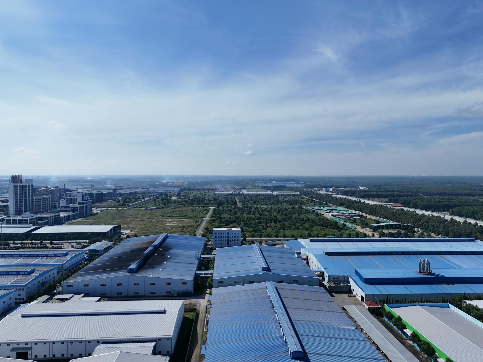 Aerial perspective showcasing industrial buildings and greenery in Bình Dương, Vietnam.